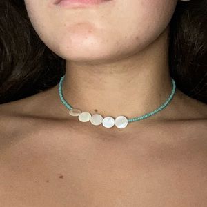 Handmade green beaded choker with flat white beads
